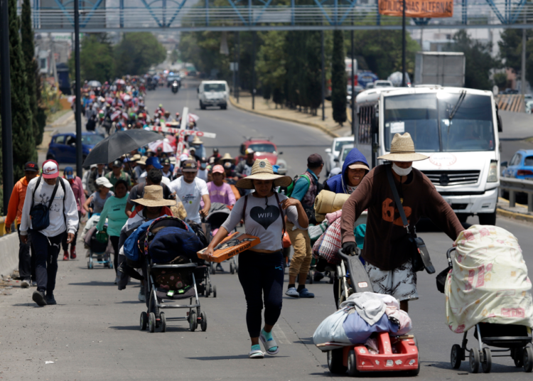Caravana con unos 600 migrantes llega a Puebla