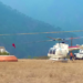 Dos aeronaves refuerzan combate a incendio forestal entre Aquixtla y Tetela